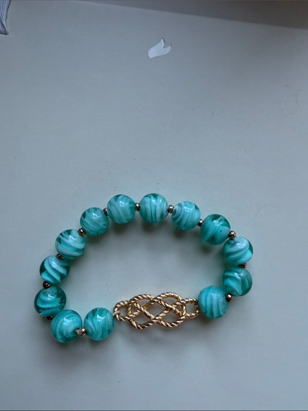 J. Crew Turquoise Swirl Beaded Bracelet with Gold Knot